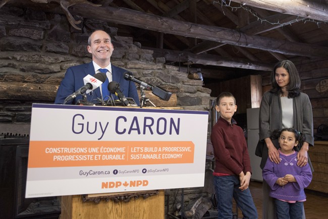 NDP MP Guy Caron stands with his son Dominic, 8, daughter Edith, 5, and wife Valerie Stansfield as he announces that he will run for the leadership of the New Democratic Party, on Monday, Feb. 27, 2017 in Gatineau, Que. 