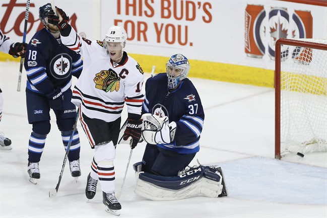 Chicago Blackhawks centre Jonathan Toews celebrates defenceman Duncan Keith's goal against the Winnipeg Jets in the third period of Friday's game.
