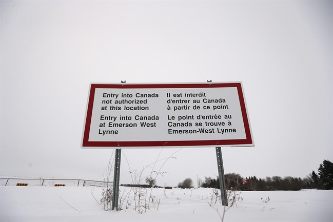 A sign is seen near Emerson, Man. Thursday, February 9, 2016. Refugees have been illegally crossing the Manitoba/U.S. border and ending up in Emerson, Manitoba.