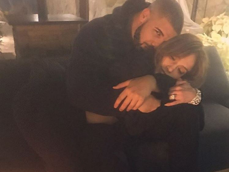 From days past: Jennifer Lopez and Drake share a snuggle.