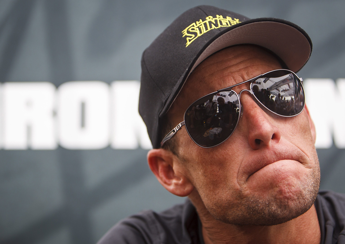 This April 1, 2012 file photo shows Lance Armstrong during a news conference in Galveston, Texas.