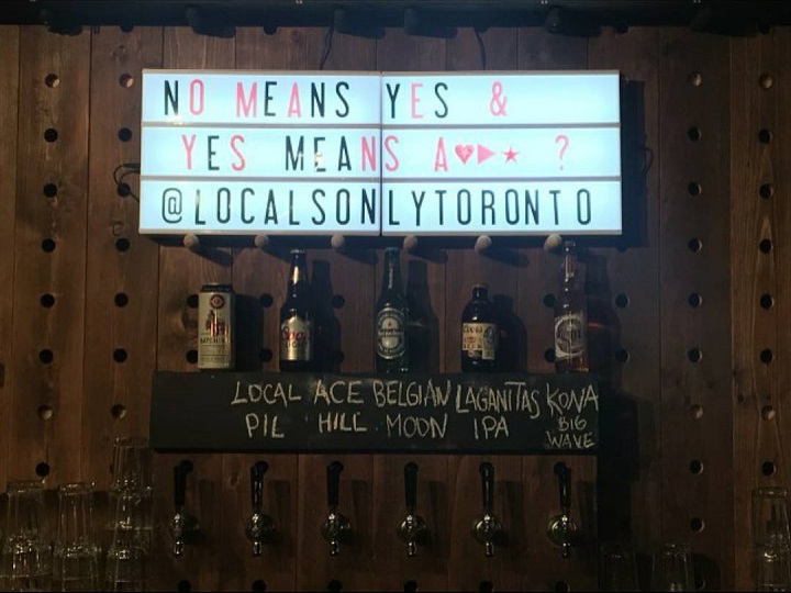 A photo of the sign shared on social media has led the Locals Only bar in Toronto to quickly issue an apology. 