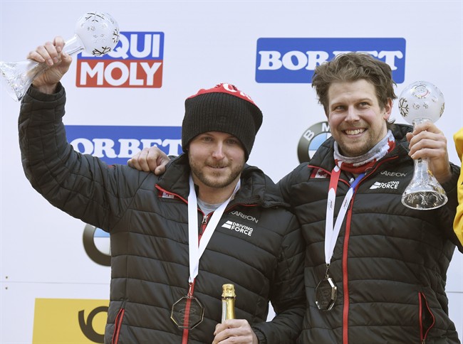 Canada's Justin Kripps, left, and Jesse Lumsden, celebrate their second place after the men's two-man bob race at the Bobsleigh and Skeleton World Championships at Lake Koenigssee, Germany, Sunday Feb. 19. 2017.