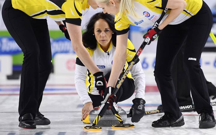 Manitoba skip Michelle Englot delivers a shot against Saskatchewan during the Scotties Tournament of Hearts in St. Catharines, Ont., on Sunday, Feb. 19, 2017. THE CANADIAN PRESS/Sean Kilpatrick