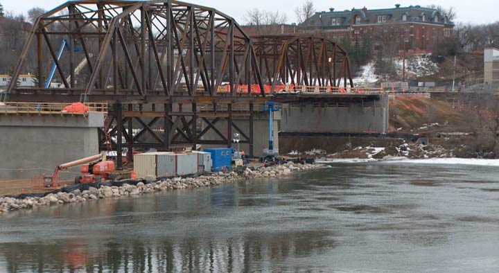 As crews construct a new Traffic Bridge over the South Saskatchewan River, people are being asked not to go underneath the temporary structure.
