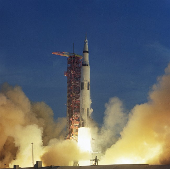 The spacecraft is carrying astronauts Frank Borman, commander, James A. Lovell Jr., and William A. Anders to a seven-day mission scheduled to include 10 orbits of the moon.