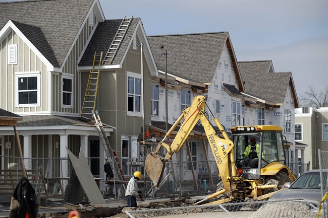 CMHC says 206 new homes were built in Hamilton last month, down from 319 in June of last year.