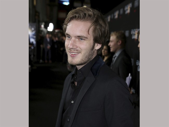 In this Oct. 28, 2013 file photo, YouTube star Felix Kjellberg arrives at the premiere of "Ender's Game" in Los Angeles. Disney's Maker Studios and Google‚Äôs YouTube are distancing themselves from Kjellberg after he made jokes about anti-Semitism and posted Nazi imagery in his videos. Kjellberg, a Swedish YouTube star known as PewDiePie, with more than 53 million subscribers, rose to fame by posting gaming videos.