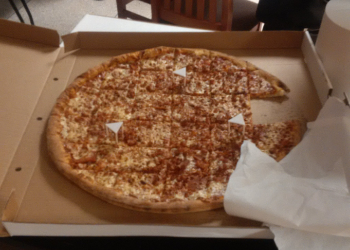 A pizza bought for passengers of an Air Canada flight that was rerouted to Fredericton. A WestJet pilot stepped in to buy them pizza. 