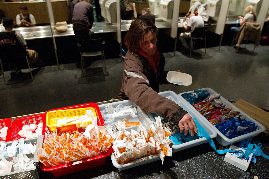 A client of the Insite supervised injection Center in Vancouver collects her kit on May 3, 2011.
