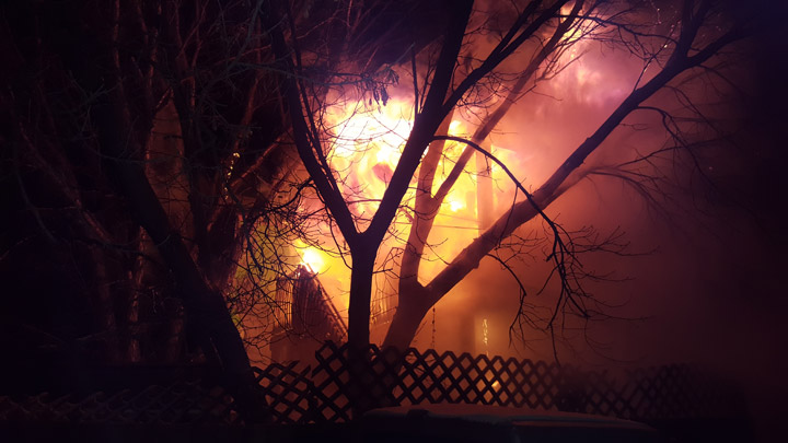 Crews with the Saskatoon Fire Department had to deal with a house and garage fire in just over an hour on Tuesday evening.