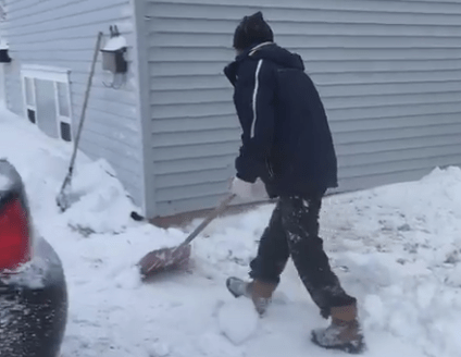 FILE: A driveway is shoveled after snow fell on New Brunswick Feb. 13, 2017. 