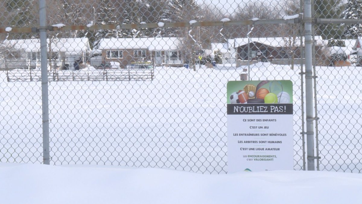 Police say a man allegedy seen handing out hockey pucks to children in a Saint-Bruno park was only handing out promotional items. Tuesday, Feb. 21, 2017.
