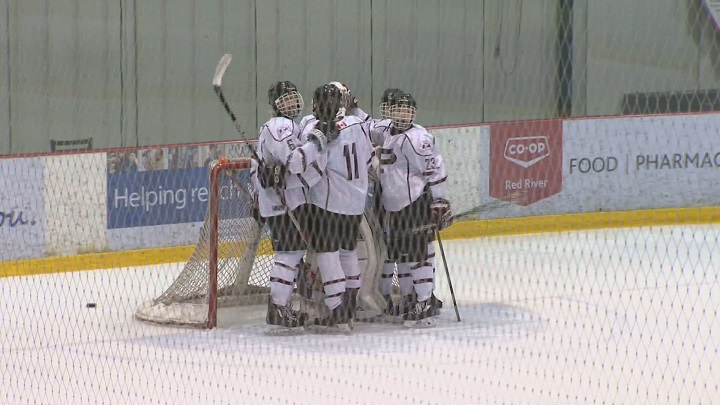 The St. Paul's Crusaders celebrate a game one victory over the Dakota Lancers in the division one final.