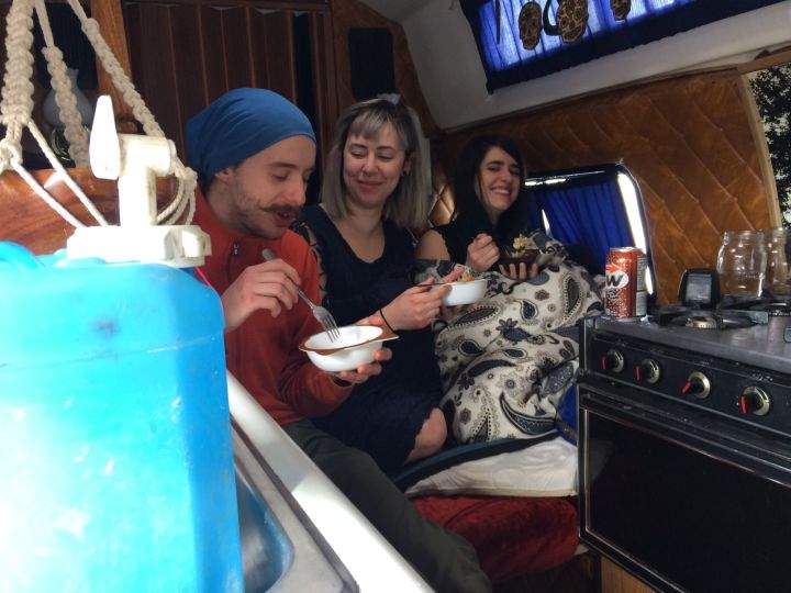 Alana Keleigh (centre) and friends, in her van “Carl”