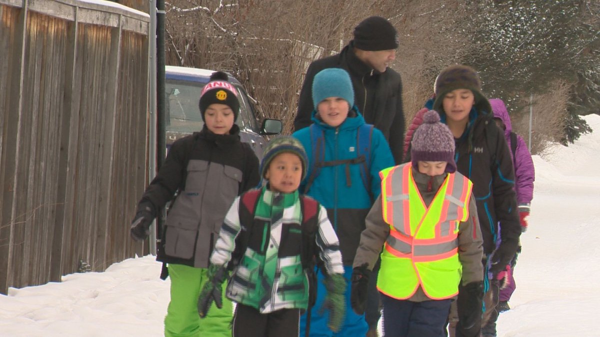MLA David Shepherd walks to school with students at Edmonton's Belgravia School, Wednesday, Feb. 8, 2017. 