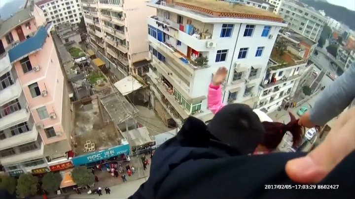 Woman Jumps Off Building Caught By Hair News Videos And Articles 3331
