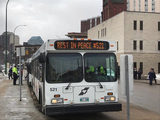 A bus takes part in the funeral for Winnipeg Transit bus driver Irvine Fraser in Winnipeg, Tuesday, Feb.21, 2017. Irvine Fraser died last Tuesday after he was allegedly attacked by a passenger on his bus at the University of Manitoba.