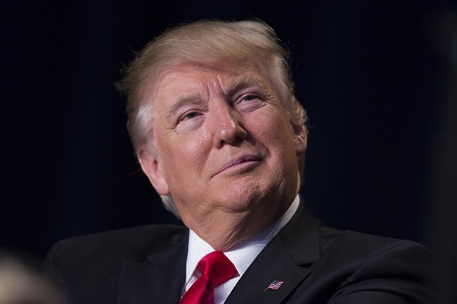 In this Feb. 2, 2017, photo, President Donald Trump listens as he is introduced during the National Prayer Breakfast in Washington. Two weeks into his presidency, Donald Trump has thrown Washington into a state of anxious uncertainty. Policy pronouncements sprout up from the White House in rapid succession. Some have far-reaching implications, most notably Trump‚Äôs temporary refugee and immigration ban, but others disappear without explanation, including planned executive actions on cybersecurity and the president‚Äôs demand for an investigation into unsubstantiated voter fraud. The day‚Äôs agenda can quickly be overtaken by presidential tweets, which often start flashing on smartphones just as the nation‚Äôs capital is waking up.(AP Photo/Evan Vucci).