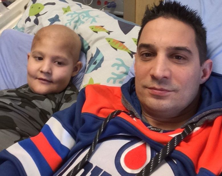 Brady and his dad Terry Mishio.