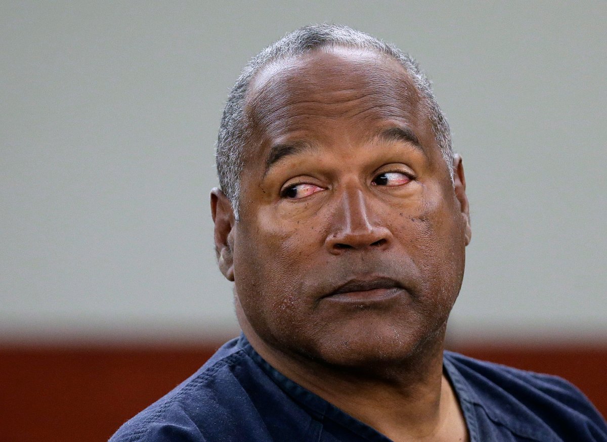 FILE - In this May 13, 2013, file photo, O.J. Simpson appears during an evidentiary hearing in Clark County District Court, in Las Vegas. Prosecutors in Las Vegas say Simpson got a fair trial in a hotel room confrontation over sports memorabilia, and the evidence supporting his 2008 conviction and imprisonment on kidnapping and armed robbery charges is overwhelming. He has served more than six years of a 9-to-33 year Nevada prison sentence, and isn't eligible for parole until 2017. Simpson lawyers didn't immediately respond Tuesday, Sept. 30, 2014 to messages. Simpson is now 67.