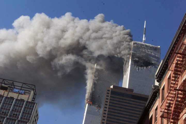 Smoke rises from the burning twin towers of the World Trade Center after hijacked planes crashed into the towers in New York City, Sept. 11, 2001.