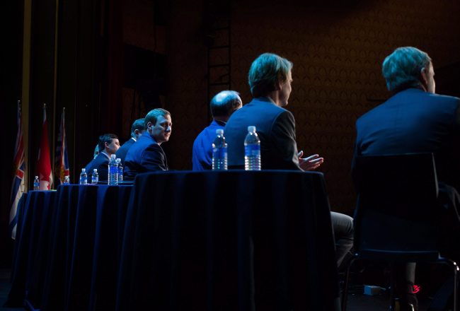 Brad Trost, centre left, sits on stage with other candidates during a federal Conservative Party leadership debate in Vancouver, B.C., Feb. 19, 2017. 