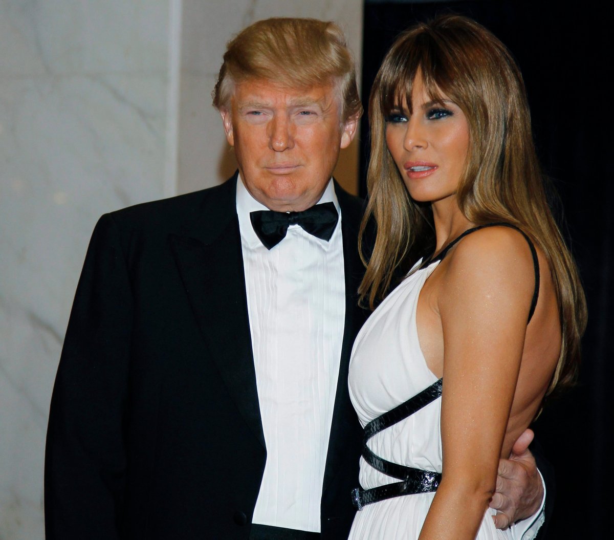 In this April 30, 2011, file photo Donald Trump, left, and Melania Trump arrive for the White House Correspondents Dinner in Washington. 