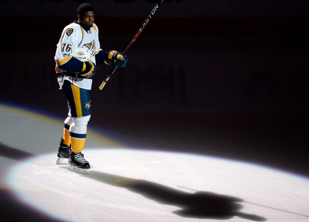 Nashville Predators' P.K. Subban salutes fans of his former team prior to facing the Montreal Canadiens in NHL hockey action, in Montreal on Thursday, March 2, 2017. 