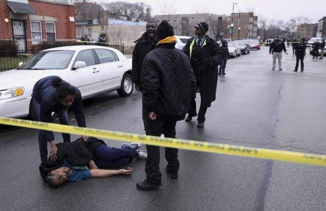 Georgia Jackson, 72, is overcome with emotion upon learning that her two grandsons, Raheem and Dillon Jackson were found fatally shot in the South Shore neighborhood of Chicago on Thursday, March 30, 2017. 