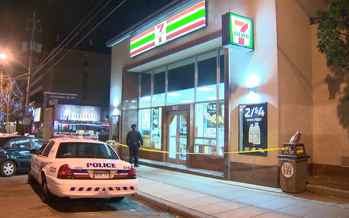 Police investigate a robbery at a 7-Eleven store in Etobicoke on March 28, 2017.