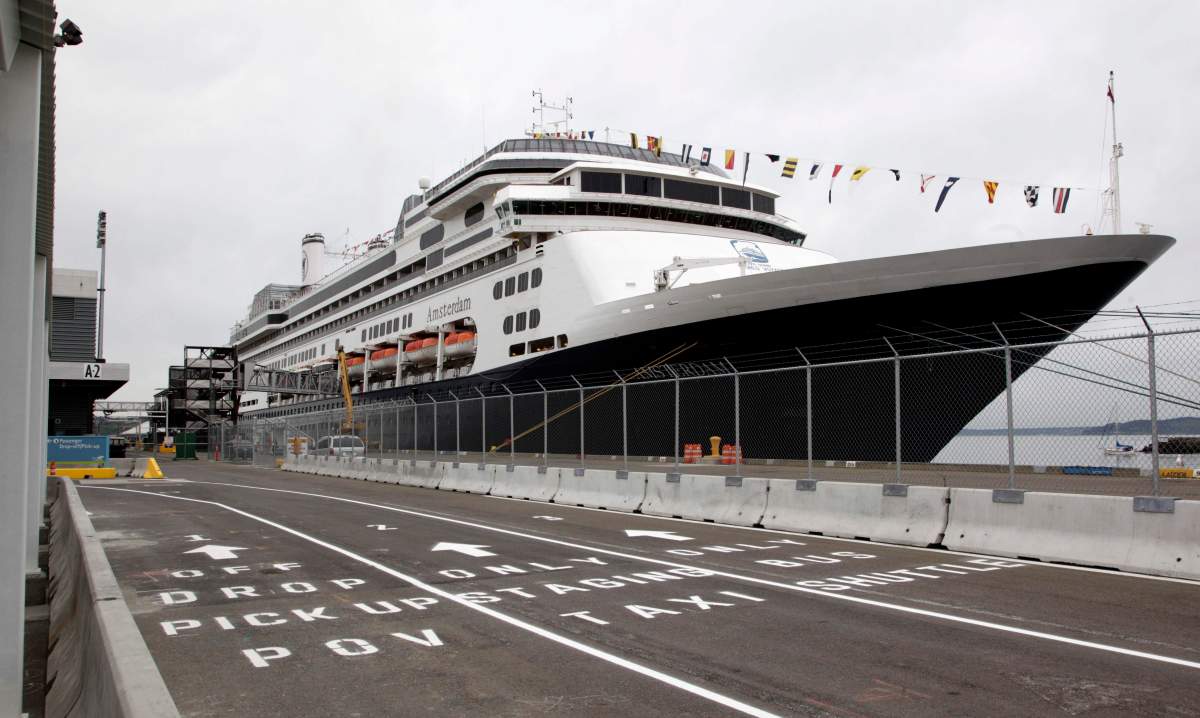 The MS Amsterdam cruise ship, operated by Holland America Line, sits docked Monday, April 26, 2010, in Seattle. The ship was in Seattle for a stop during an around-the-world voyage. 