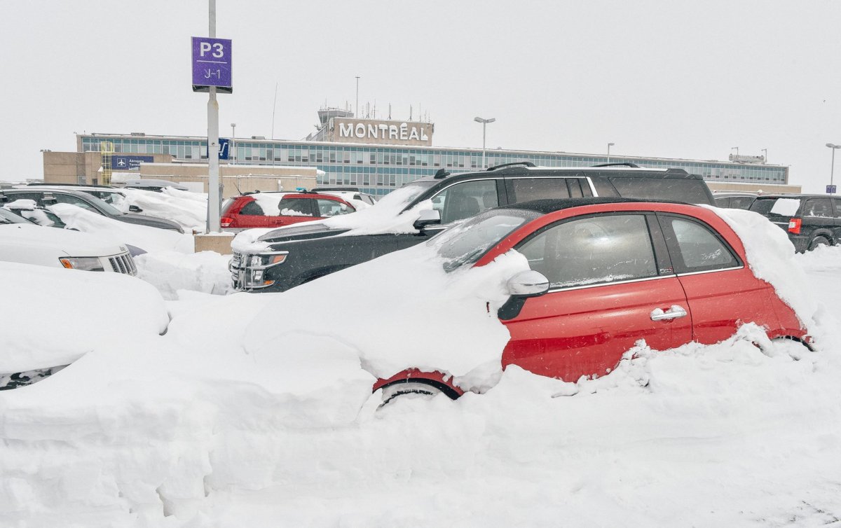 Montreal Trudeau airport employees volunteer to clear snow-covered cars ...