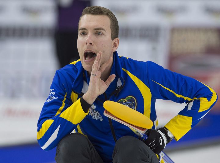 Alberta skip Brendan Bottcher directs the sweep against Newfoundland and Labrador at the Tim Hortons Brier curling championship at Mile One Centre in St. John's, on Saturday, March 4, 2017. 