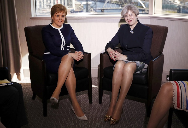 Britain's Prime Minister Theresa May and Scotland's First Minister Nicola Sturgeon meet in a hotel in Glasgow, Scotland, March 27, 2017. REUTERS/Russell Cheyne.