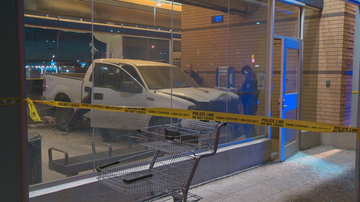 Police investigate after a pickup truck crashed into the Meadows Transit Centre on March 2, 2017.