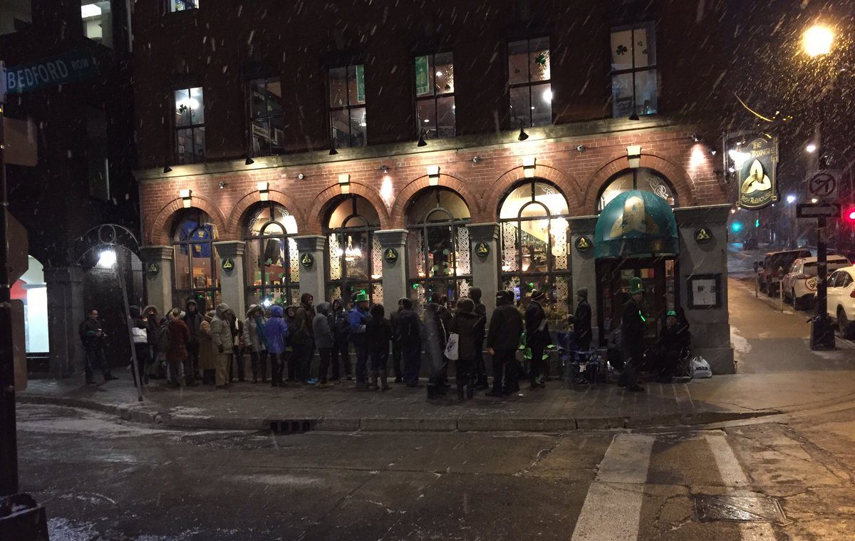 Haligonians lineup outside The Old Triangle Irish Alehouse on St. Patrick's Day morning. 