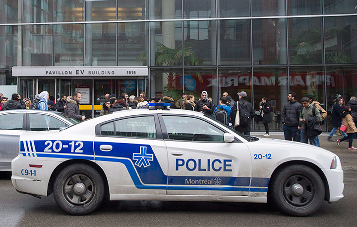 A police cruiser is shown outside Concordia University in Montreal, Wednesday, March 1, 2017, following a bomb threat.