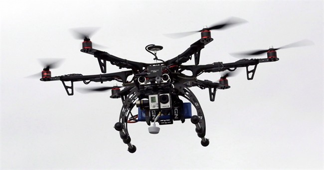In this Feb. 13, 2014, file photo, a drone is demonstrated in Brigham City, Utah. 