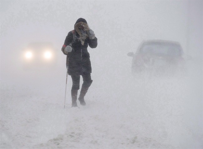 A pedestrian walks down Brunswick Street near Citadel Hill in Halifax.