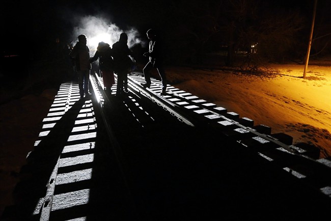 Early Sunday morning, February 26, 2017, eight migrants from Somalia cross into Canada illegally from the United States by walking down this train track into the town of Emerson, Man., where they will seek asylum at Canada Border Services Agency. 