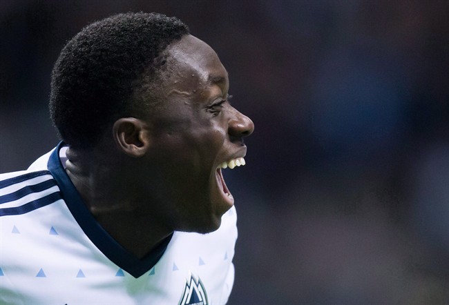 Alphonso Davies celebrates his goal during first half CONCACAF Champions League quarter-final soccer action against the New York Red Bulls, in Vancouver in a March 2, 2017, file photo.