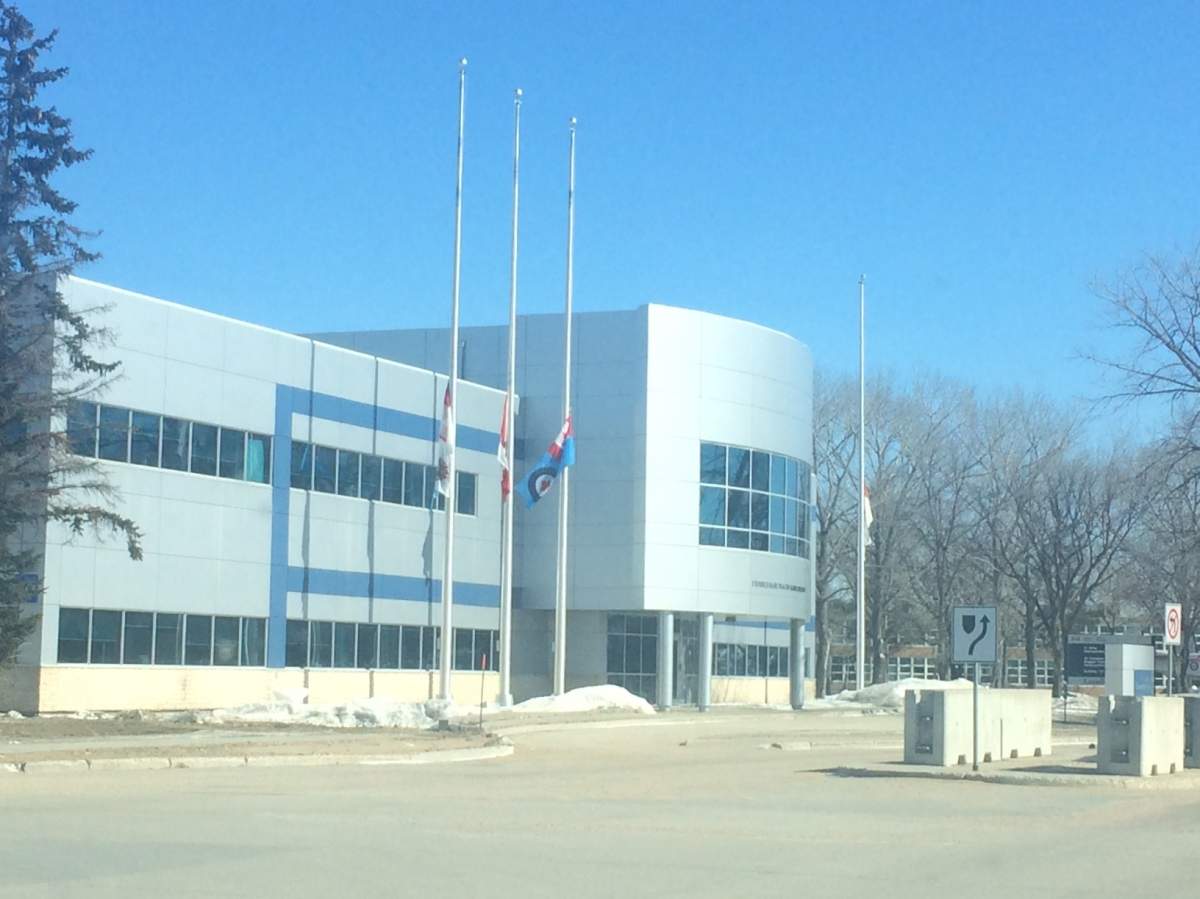Flags at half-mast at 17 Wing in Winnipeg for rescue technician who died in a training accident.