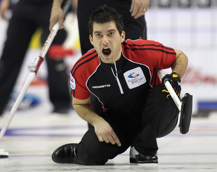 Craig Savill yells for sweeping in the gold medal game against Team Manitoba in the 2011 Tim Hortons Brier.