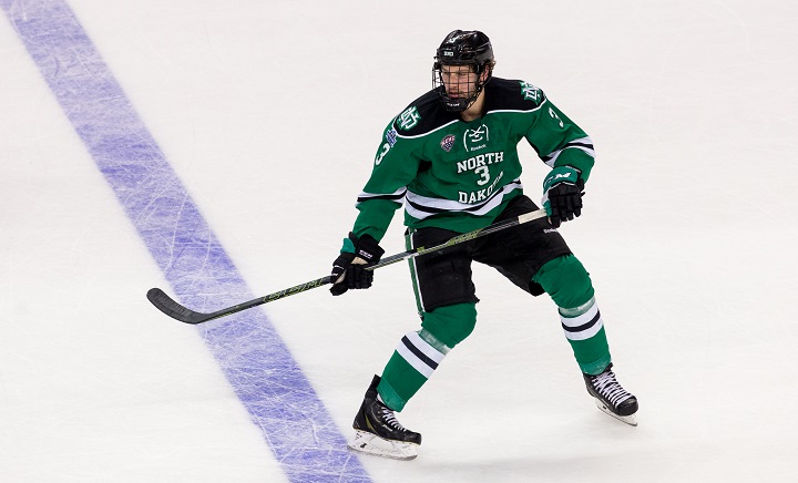 Tucker Poolman skates in a game between the North Dakota Fighting Hawks and the Quinnipiac University Bobcats during the 2016 NCAA Division I Men's Hockey Frozen Four Championship final at the Amaile Arena on April 9, 2016 in Tampa, Florida. 
