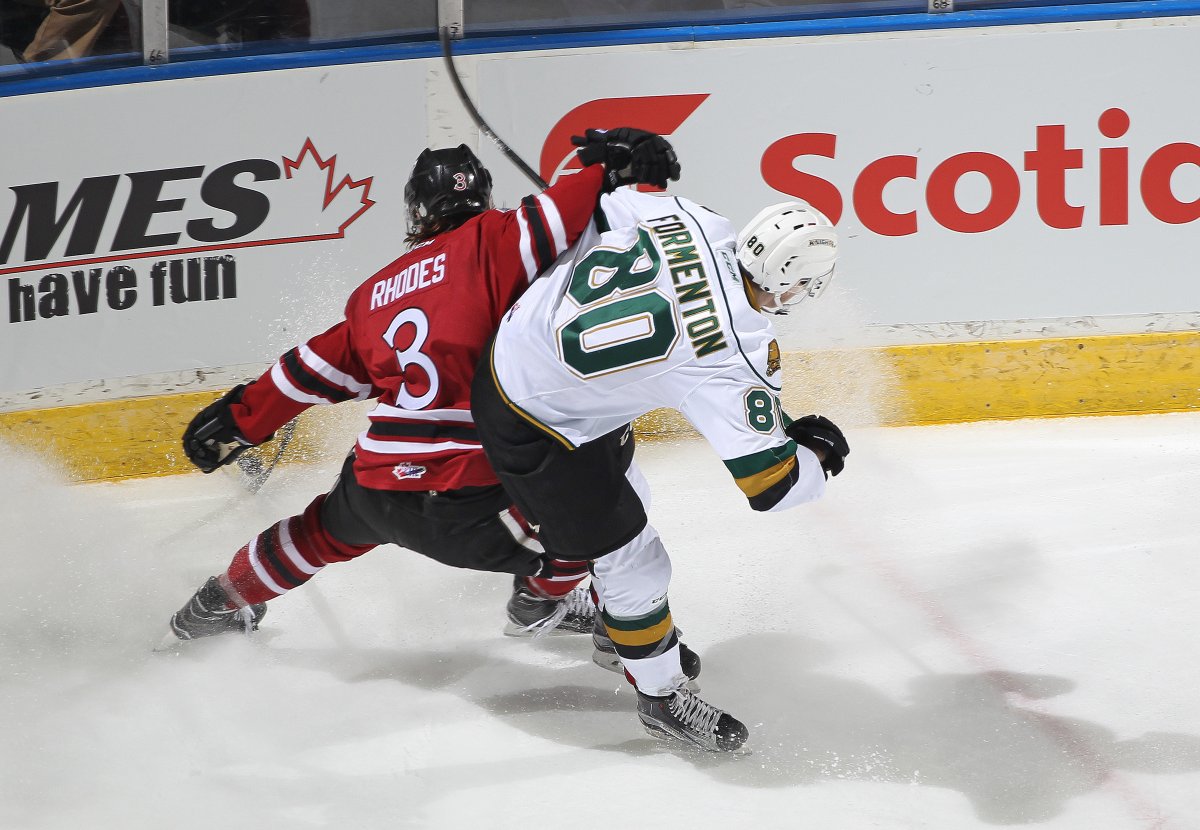 Kyle Rhodes #3 of the Guelph Storm skates against Alex Formenton #80 of the London Knights. (Photo by Claus Andersen/Getty Images).