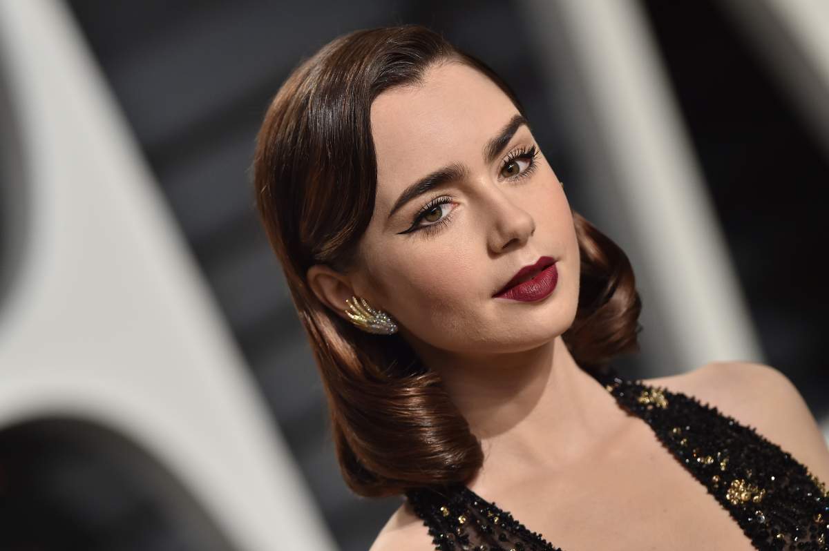 Actress Lily Collins arrives at the 2017 Vanity Fair Oscar Party Hosted By Graydon Carter at Wallis Annenberg Center for the Performing Arts on February 26, 2017 in Beverly Hills, California.