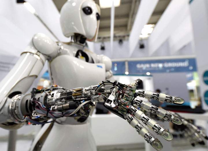 A robot is displayed at the Robotics Innovation Center booth during preparations at the CeBit computer fair, which will open its doors to the public on March 20, at the fairground in Hanover, Germany, March 18, 2017.