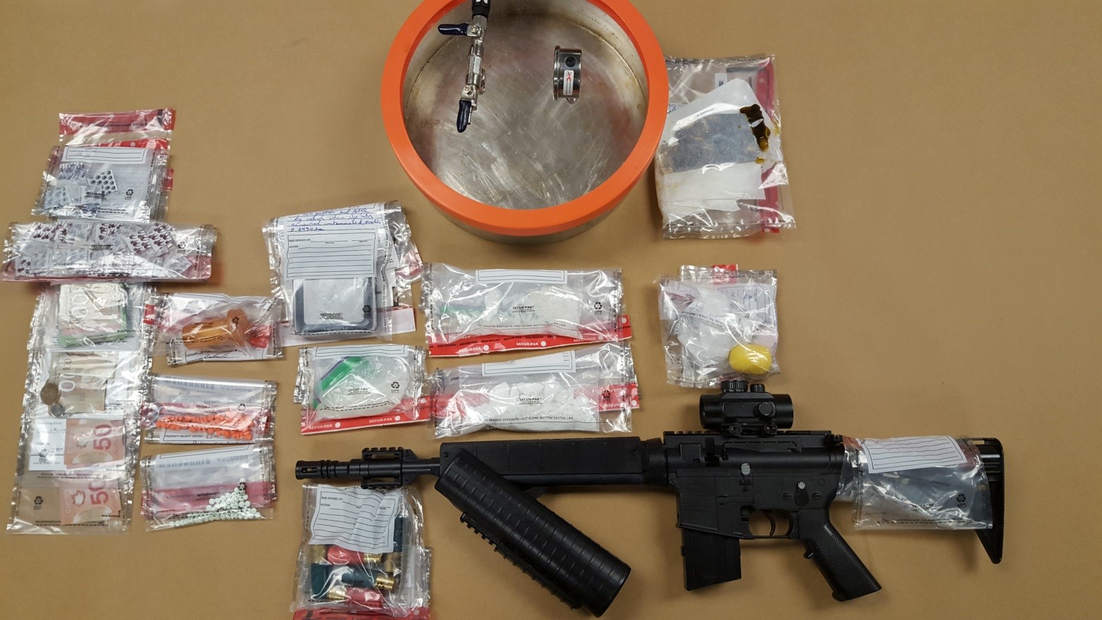 Police seize drugs and weapons from London home - London | Globalnews.ca