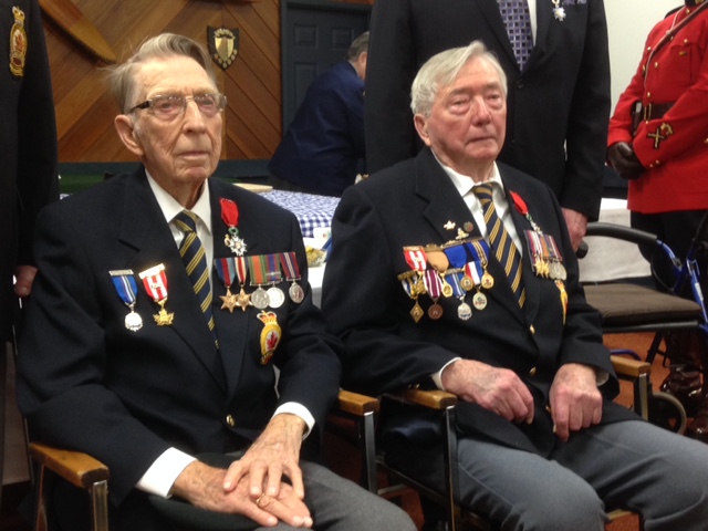 Fred Oberg (left) and Alexander Abel (right) during ceremony to receive the Legion of Honour medal. 